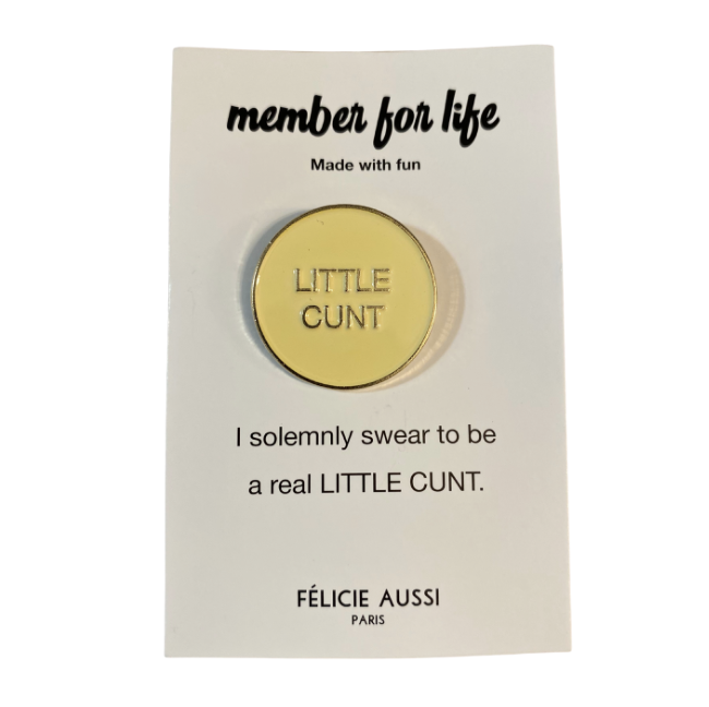 Pin's doré et blanc 