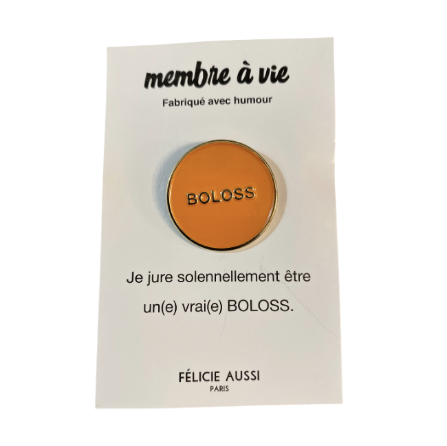 Pin's doré et orange 