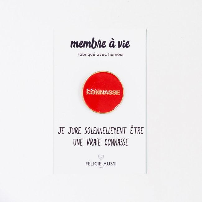 Pin's doré et rouge 