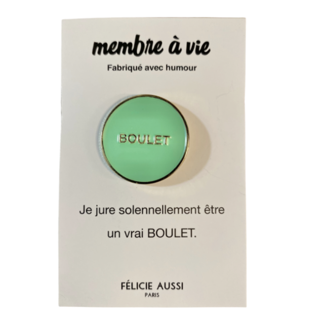 Pin's doré et vert 